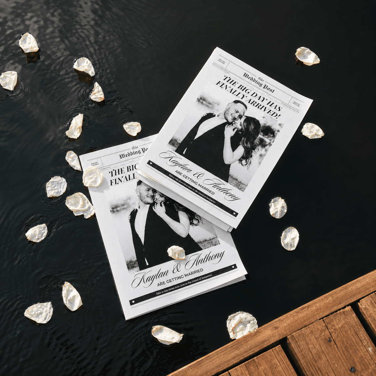 'Wedding newspaper' programmes for Kaylaa & Anthony on a jetty