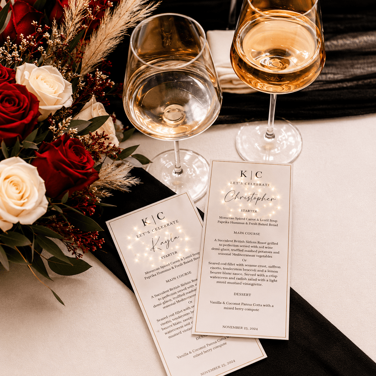 Illustrated 'Let's celebrate' menus with fairy-light motif beside wine glasses